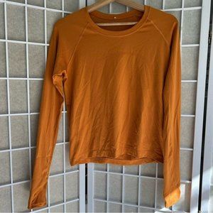 LuluLemon long sleeve swifty tech 2.0 race length orange size 10